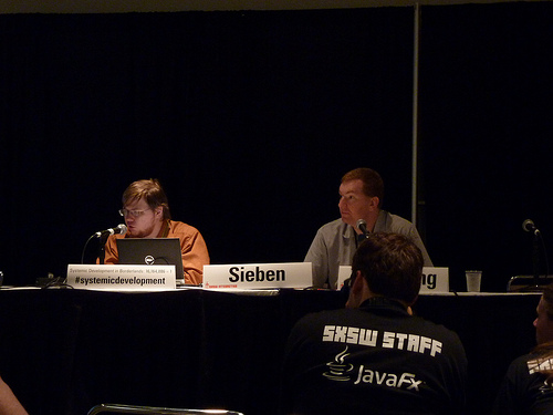 Matthew Armstrong and Jimmy Sieben giving a presentation on Borderlands as SXSW in 2010.