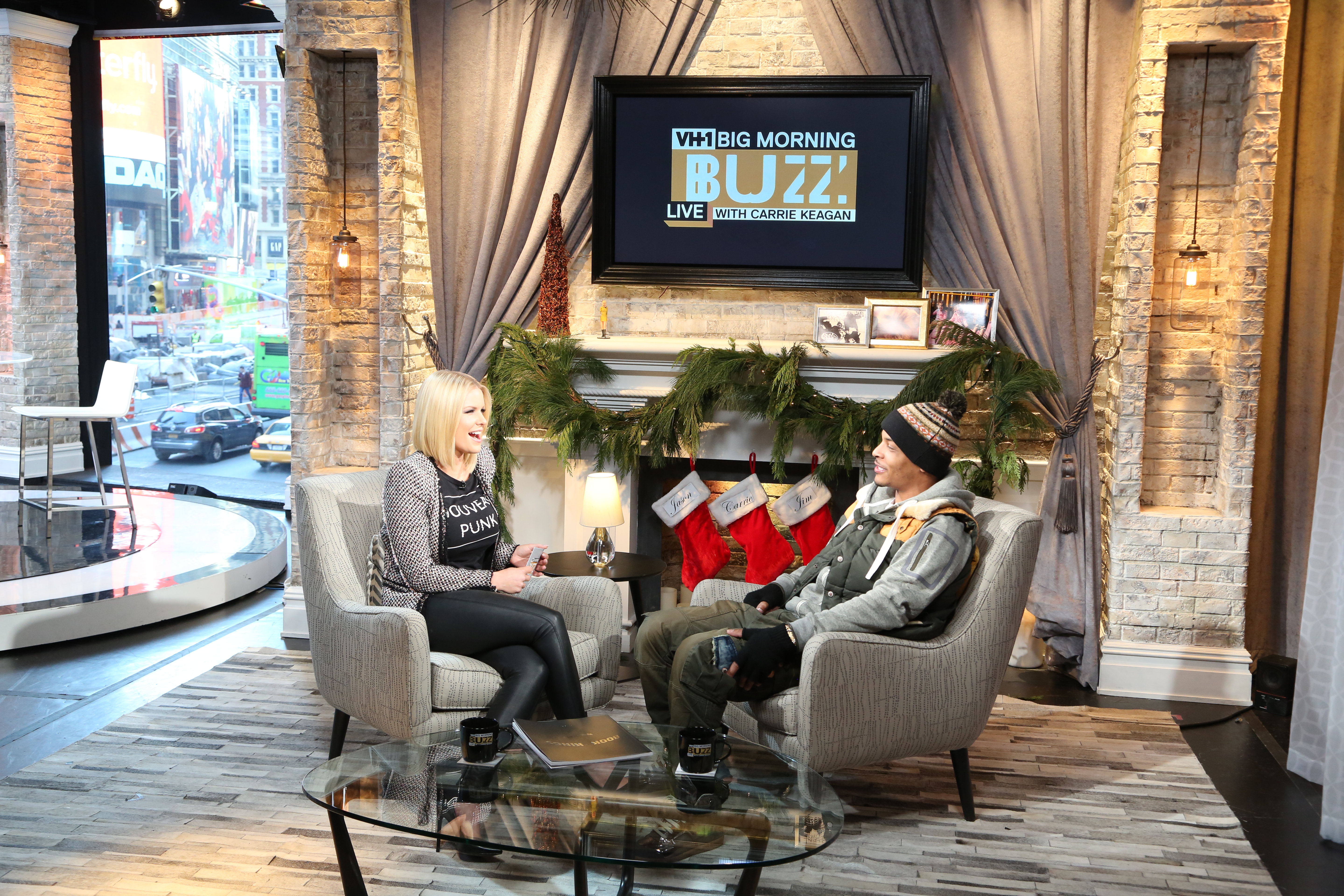 Carrie Keagan with T.I. on the set of VH1's Big Morning Buzz Live with Carrie Keagan