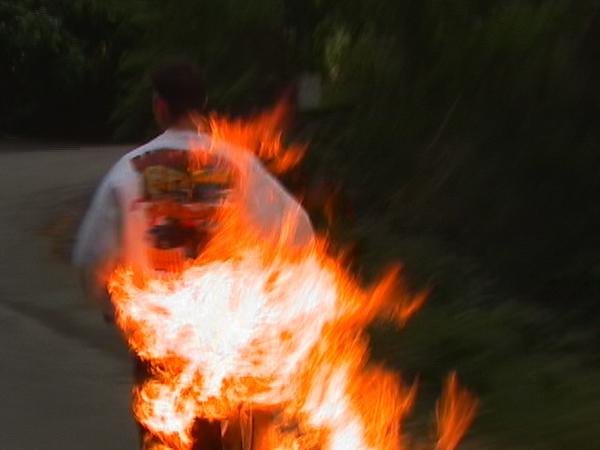 Tristan Ott doing a body burn