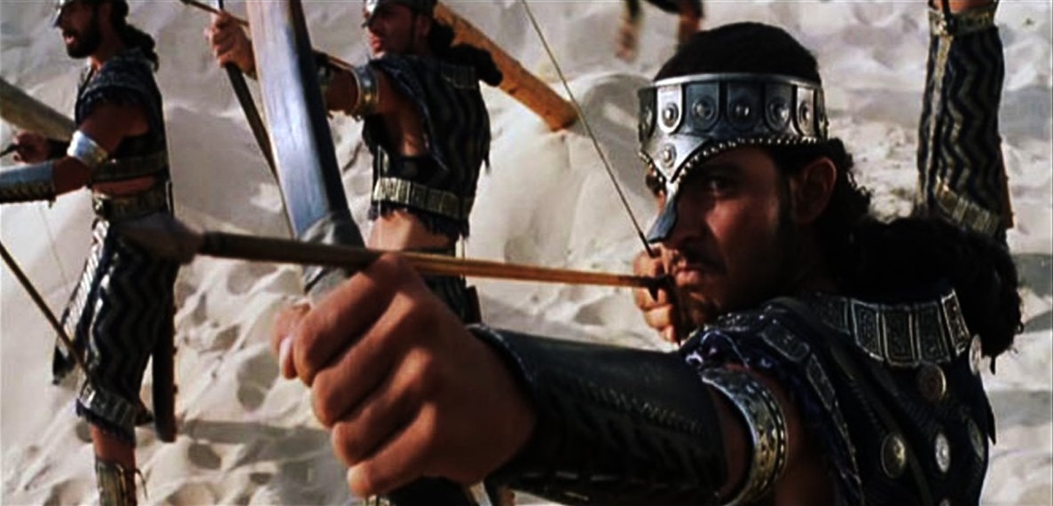 Shero Rauf as a Trojan Archer facing Brad Pitt in 3 Close ups in the movie Troy 2004