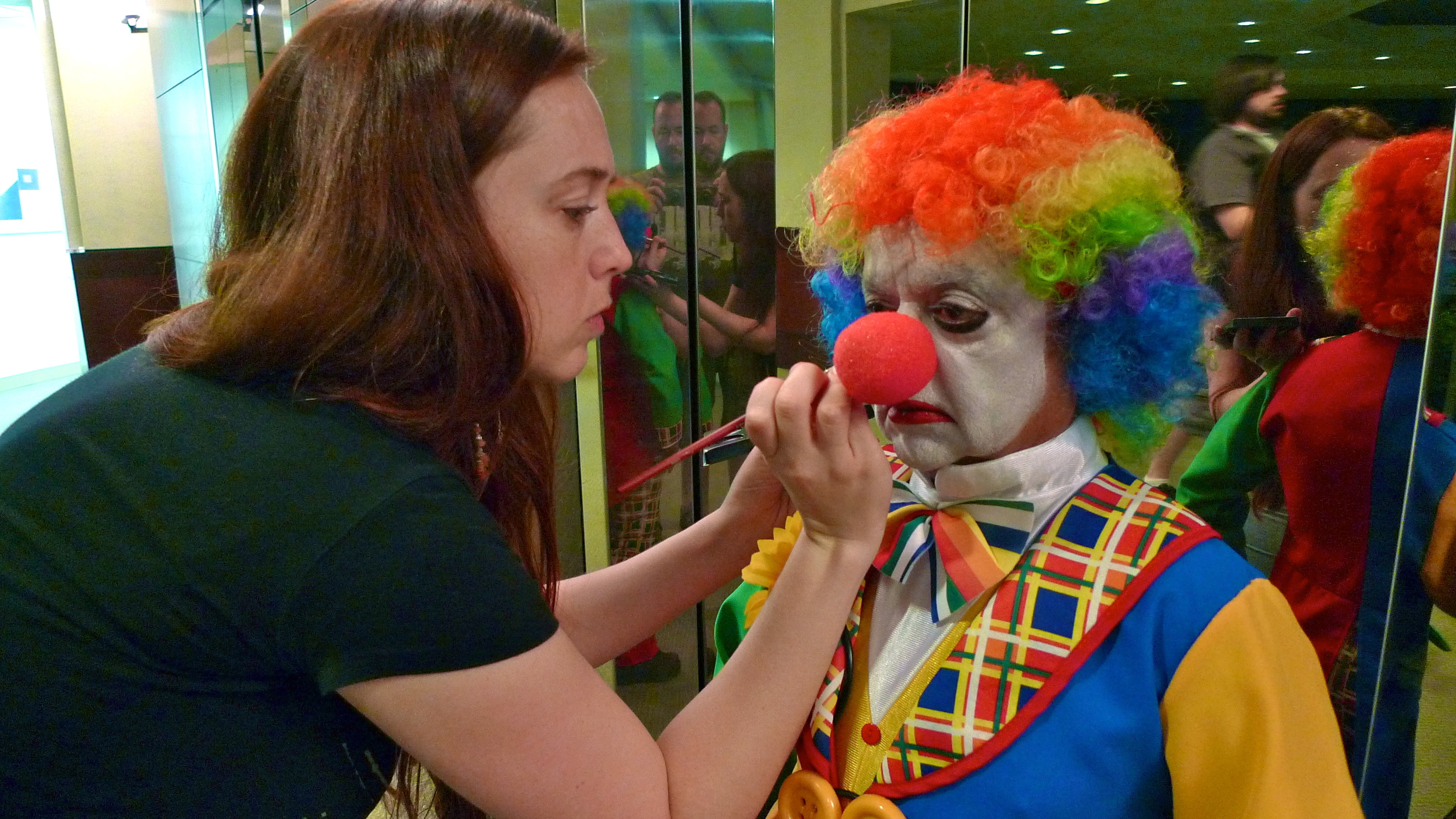 Makeup Artist RaVani Flood Durkin works on Deep Roy - on the set of THE BALLAD OF SANDEEP.