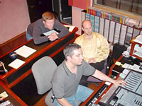 Kevin Kachin, Rich Celenza and Dean Pompinio in editing suite reviewing 