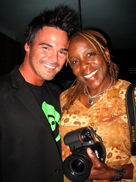 Actor Chris Winters and photographer Koi Sojer caught at an event