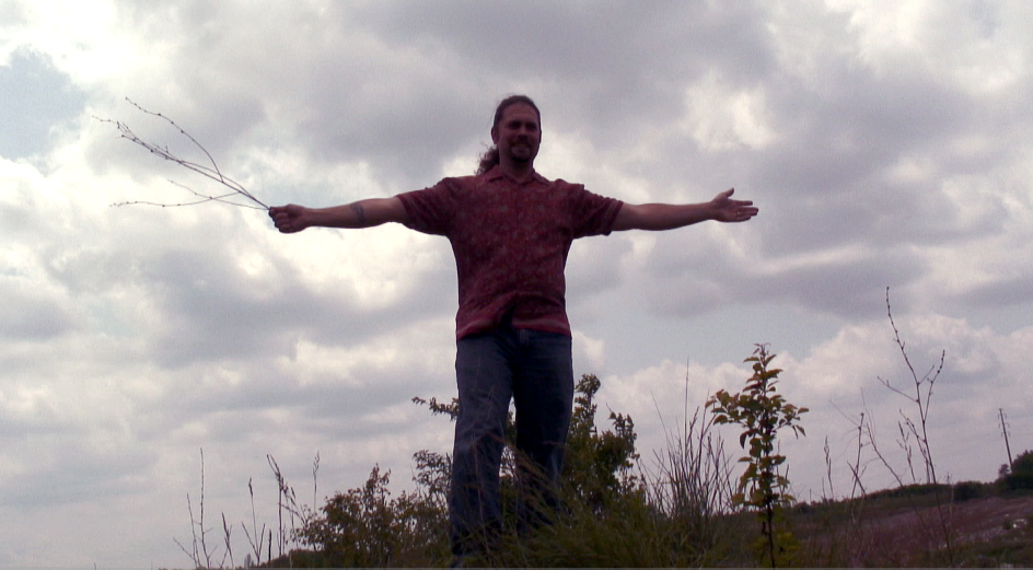 Shane Sooter demonstrates the position of the crosses in The Easter Experience during a location scout.