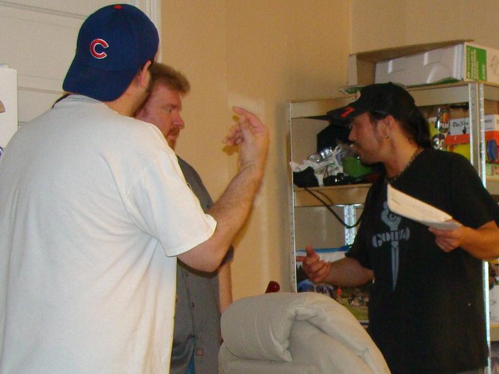 Wahlin talks with cast and crew on the set of Hand of Glory
