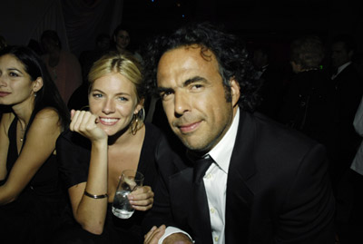 Alejandro González Iñárritu and Sienna Miller