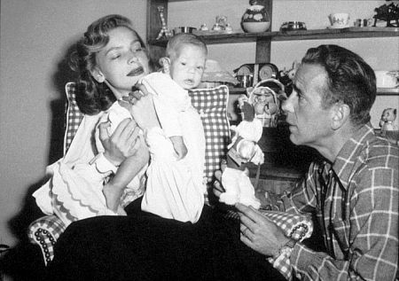 Humphrey Bogart, Lauren Bacall, and their son, Stephen, at home, 1949.