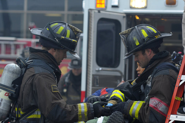 Still of Jesse Spencer and Taylor Kinney in Chicago Fire (2012)