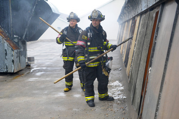 Still of Mo Gallini and Taylor Kinney in Chicago Fire (2012)