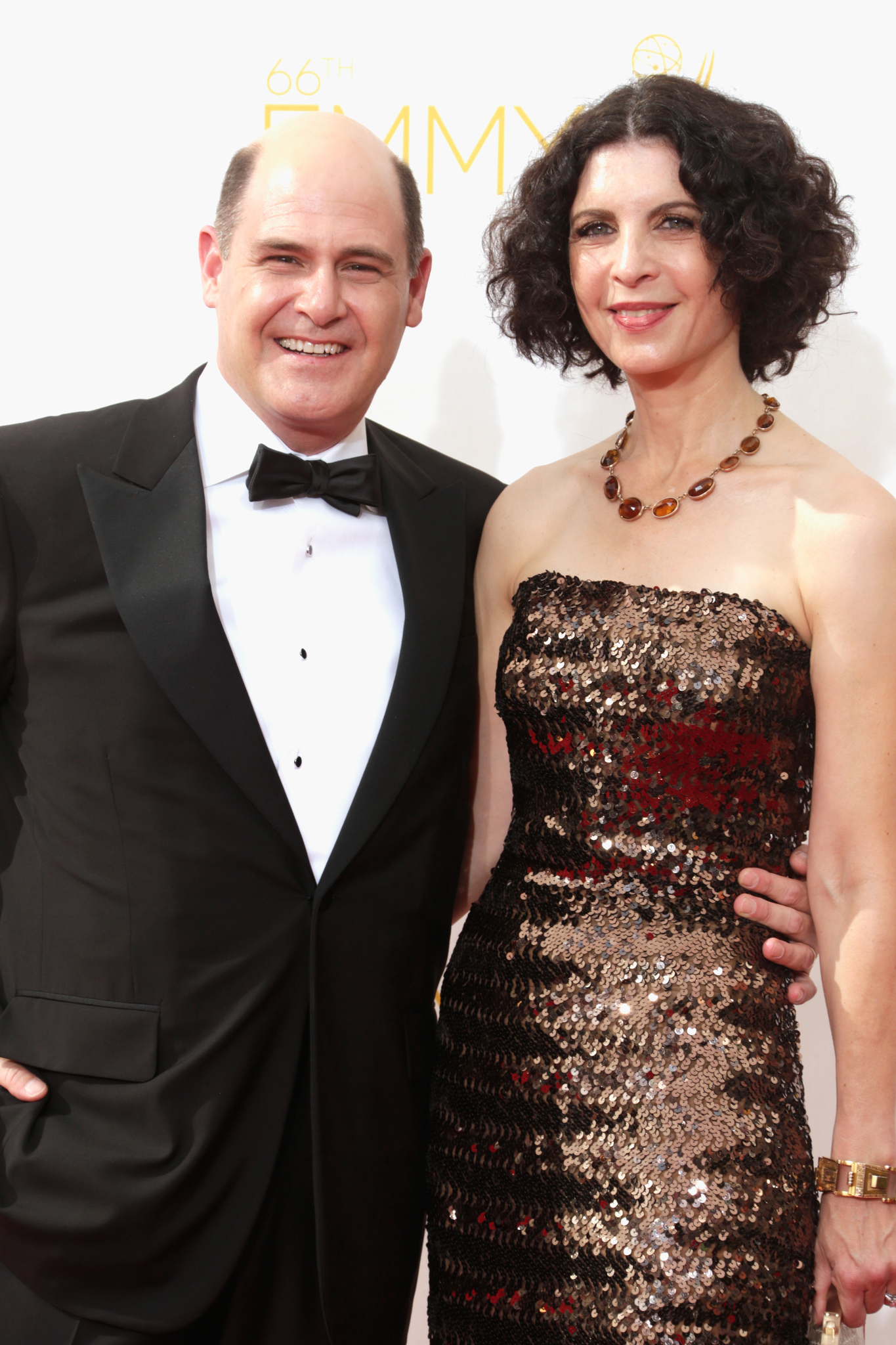 Matthew Weiner and Linda Brettler at event of The 66th Primetime Emmy Awards (2014)