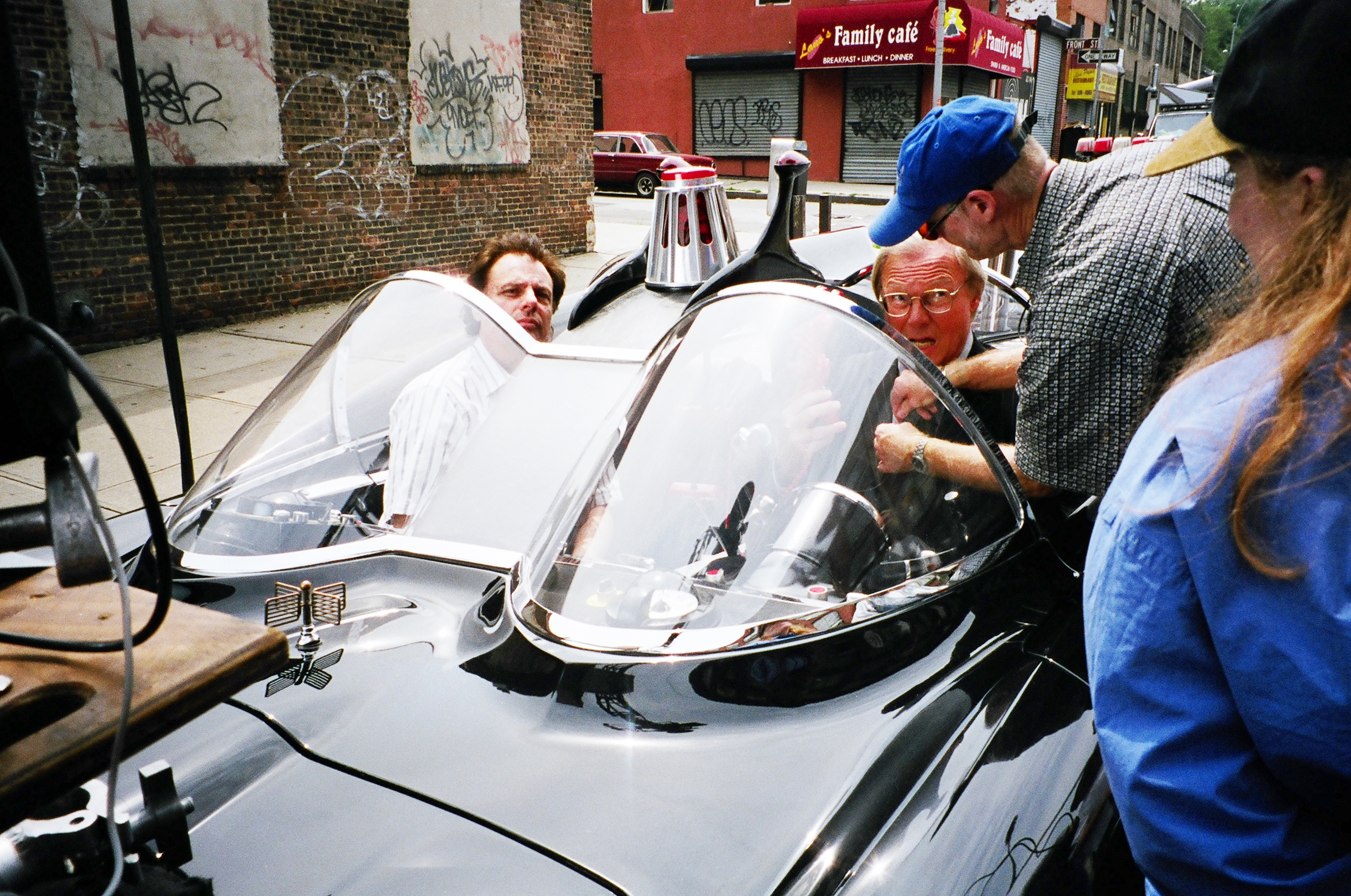 setting up the rigging and adam west's microphone on the set of a&e batweek 2003