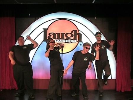 Performing at the NY Laugh Factory with Improv Troupe EIGHT IS NEVER ENOUGH