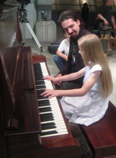 Playing piano on the Set of Battlestar Galactica
