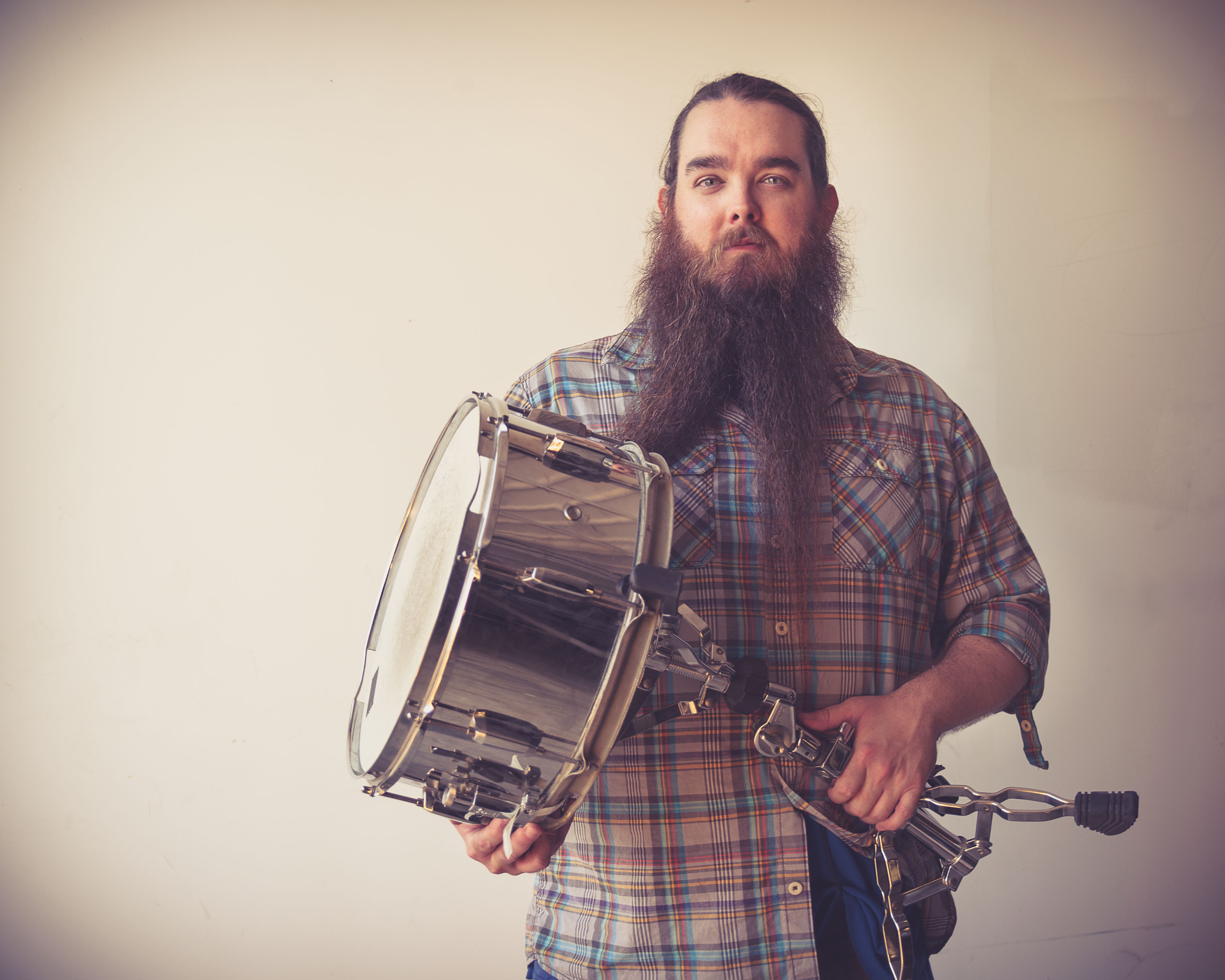 Mark Amos, carrying his own drum.