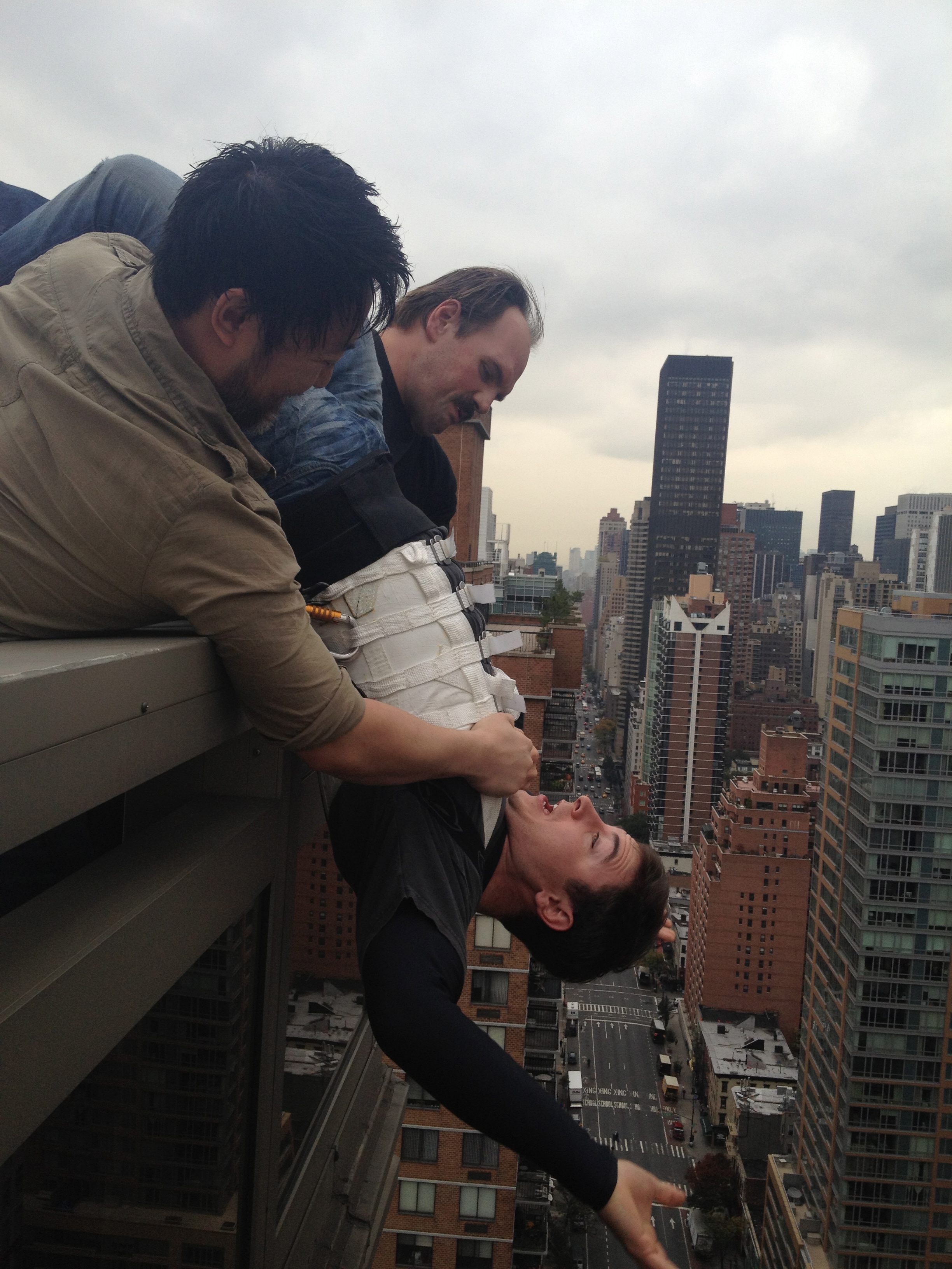 Kevin Rogers gets hung over the balcony during rehearsals on, The Wolf of Wall Street