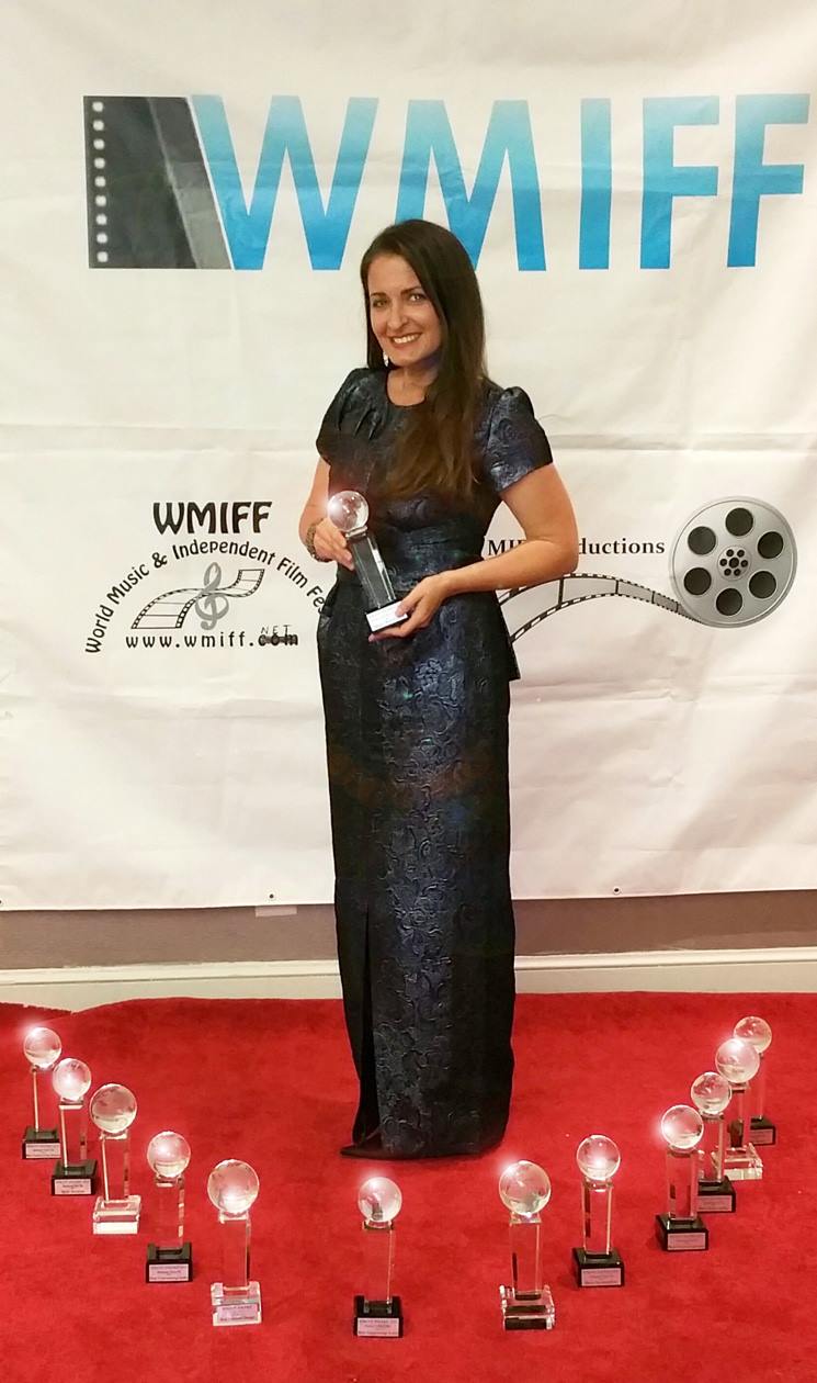 Kathleen Davison at the World Music Independent Film Festival, Washington, D.C., with the 12 collective wins for her films, Primrose Lane and Effloresce