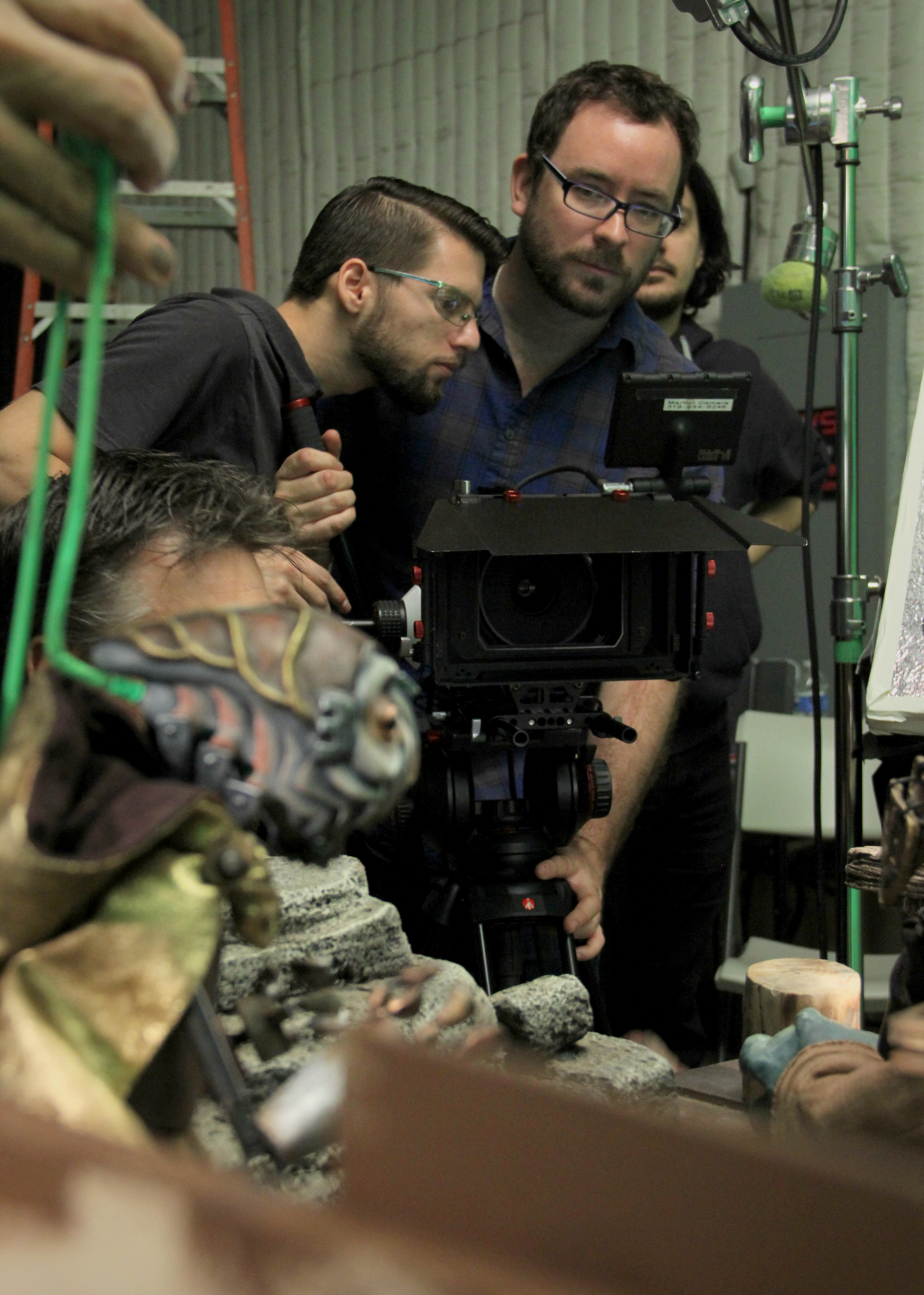 Alex frames a shot on the feature film 'Yamasong: March of the Hollows.'