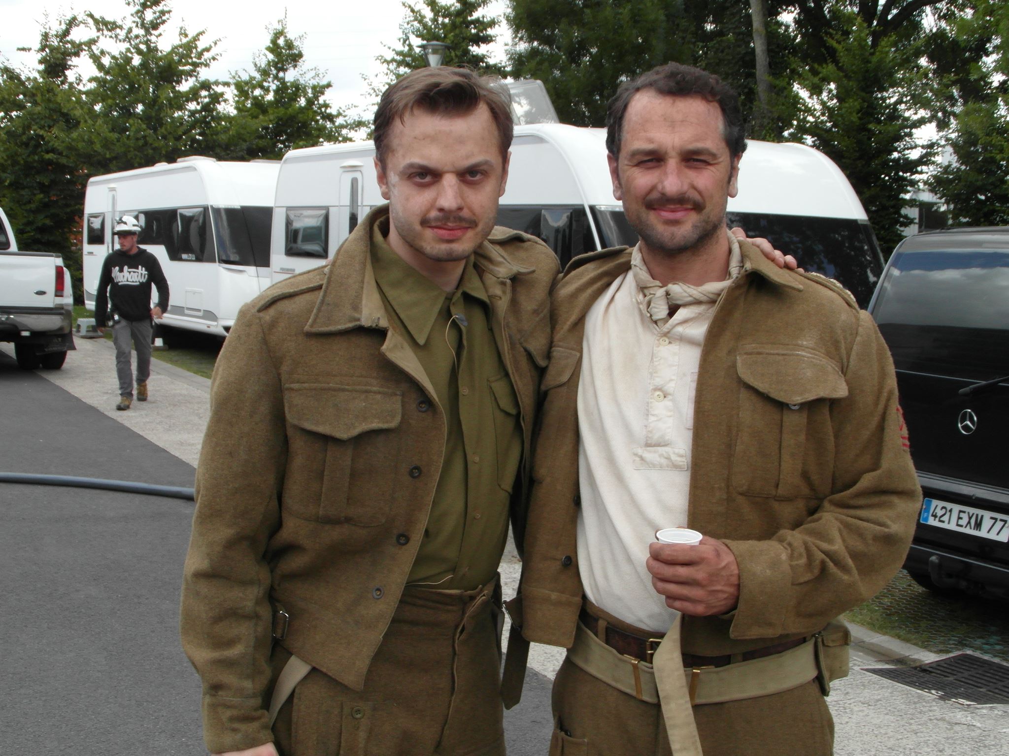 Maximilien Poullein alongside Matthew Rhys on the set of 