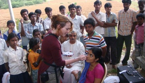 On set in India surrounded by on-lookers.