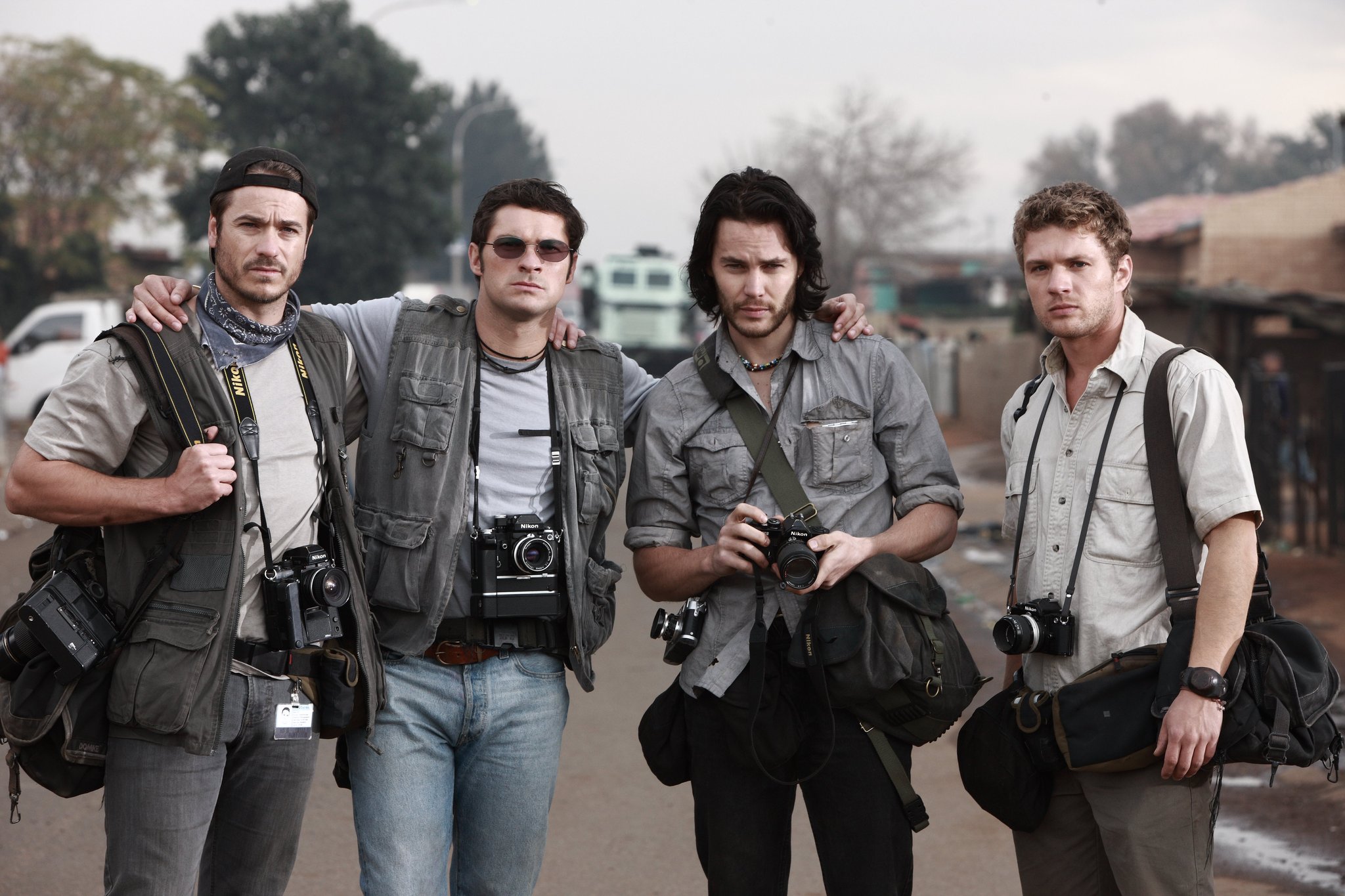 Still of Ryan Phillippe, Frank Rautenbach, Taylor Kitsch and Neels Van Jaarsveld in The Bang Bang Club (2010)