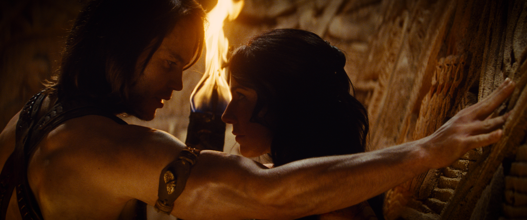 Still of Lynn Collins and Taylor Kitsch in Dzonas Karteris (2012)