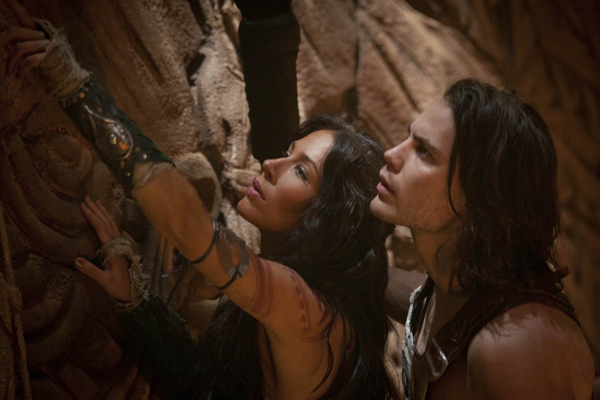 Still of Lynn Collins and Taylor Kitsch in Dzonas Karteris (2012)