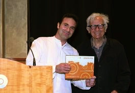 Legendary filmmaker Albert Maysles presents the Global Justice Award to Marcelo Bukin. HBO Headquarters Theater, New York City.