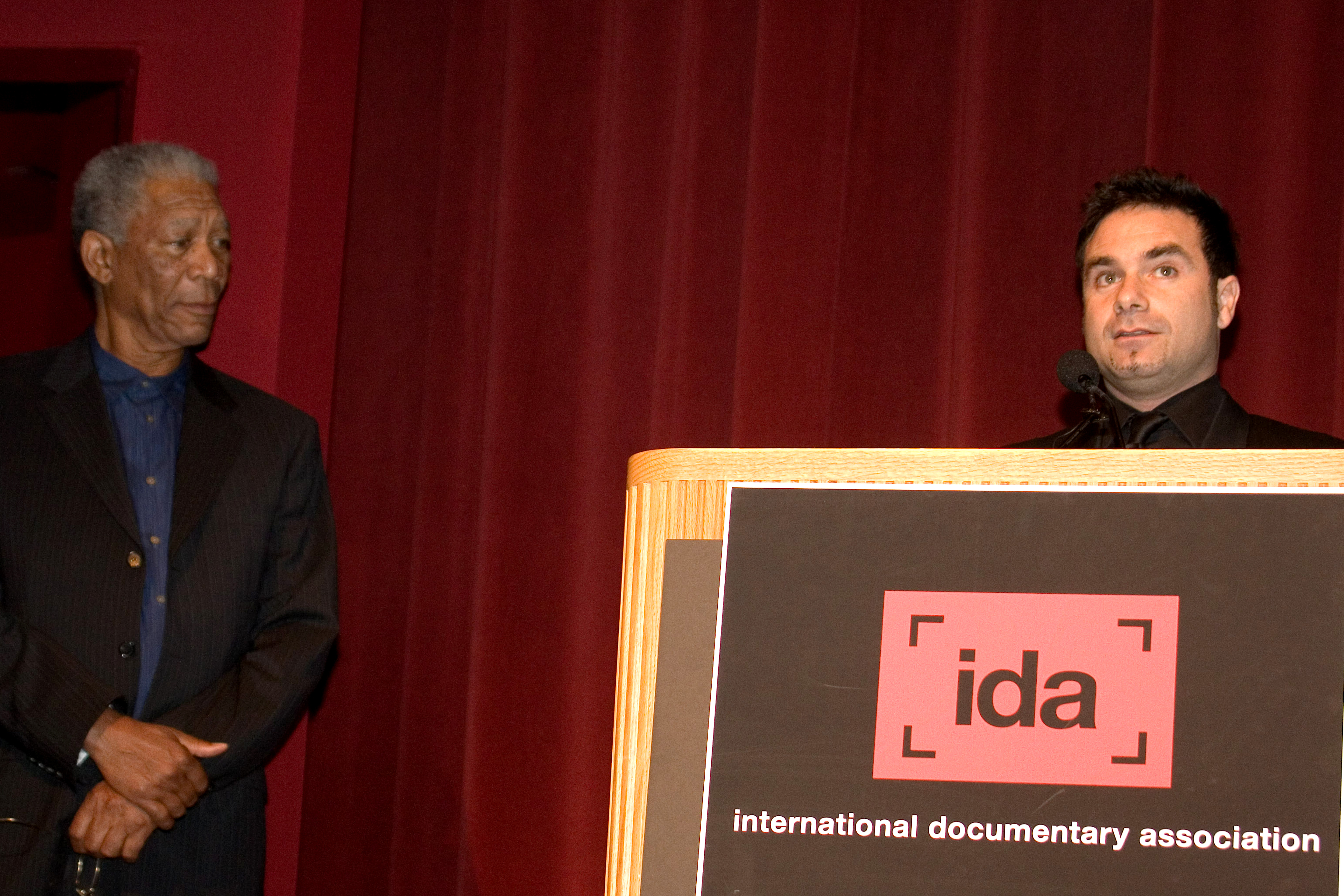 Actor Morgan Freeman presenting the IDA Award to Marcelo Bukin. DGA/Directors Guild of America Theater, Hollywood