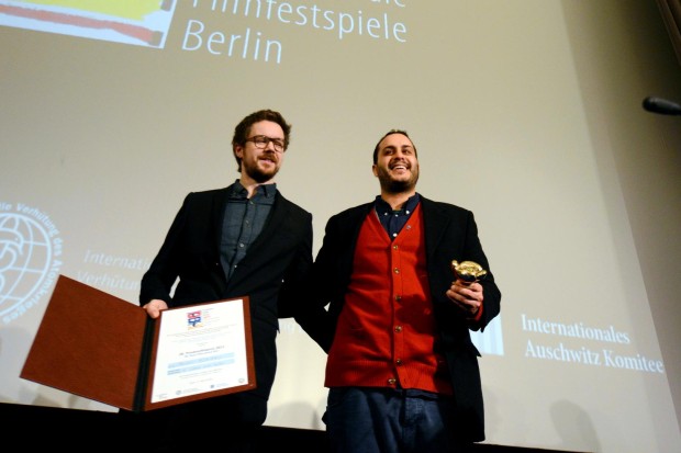 Director Mahdi Fleifel with producer Patrick Campbell receiving the Peace Film Prize for A WORLD NOT OURS at the 2013 Berlinale