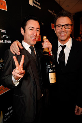 Alan Cumming and Tim Daly