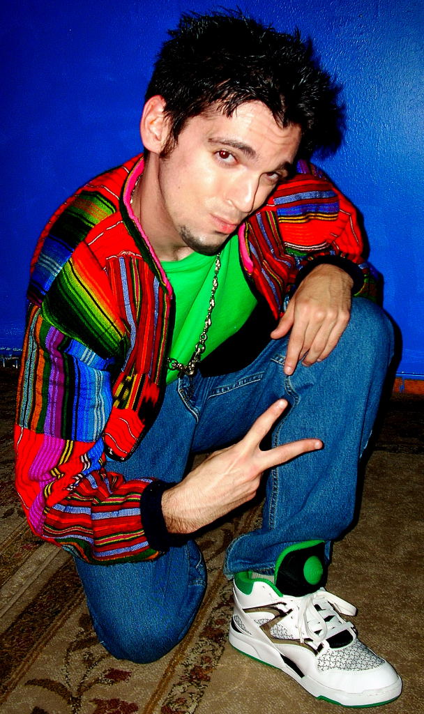 Evan King as the '90s DJ 