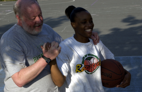 Still of Darnellia Russell and Bill Resler in The Heart of the Game (2005)