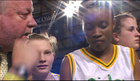 Still of Darnellia Russell and Bill Resler in The Heart of the Game (2005)