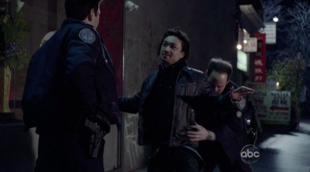 Norman Yeung as Tommy Chan, with Ben Bass and Matt Gordon in ROOKIE BLUE