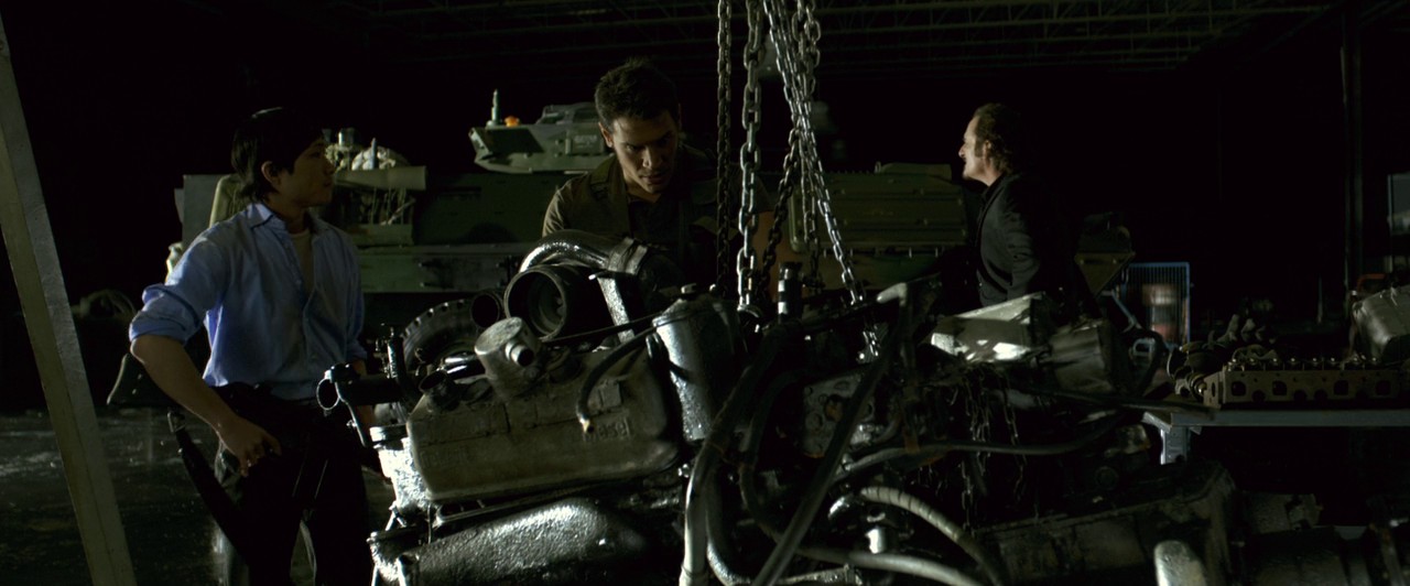 Norman Yeung as Kim Yong, with Sergio Peris-Mencheta and Kim Coates in RESIDENT EVIL: AFTERLIFE