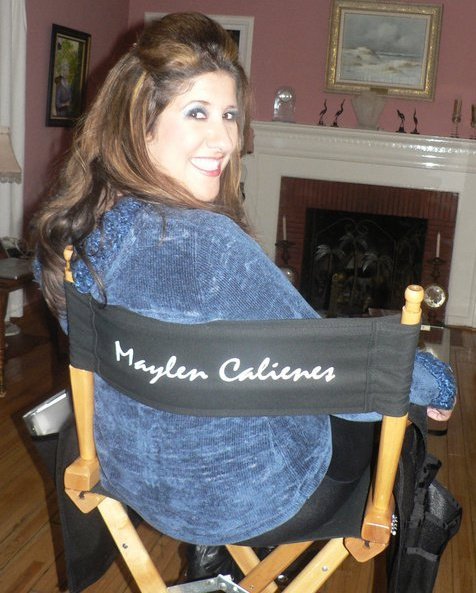 Maylen Calienes sitting in her Directors chair while filming 