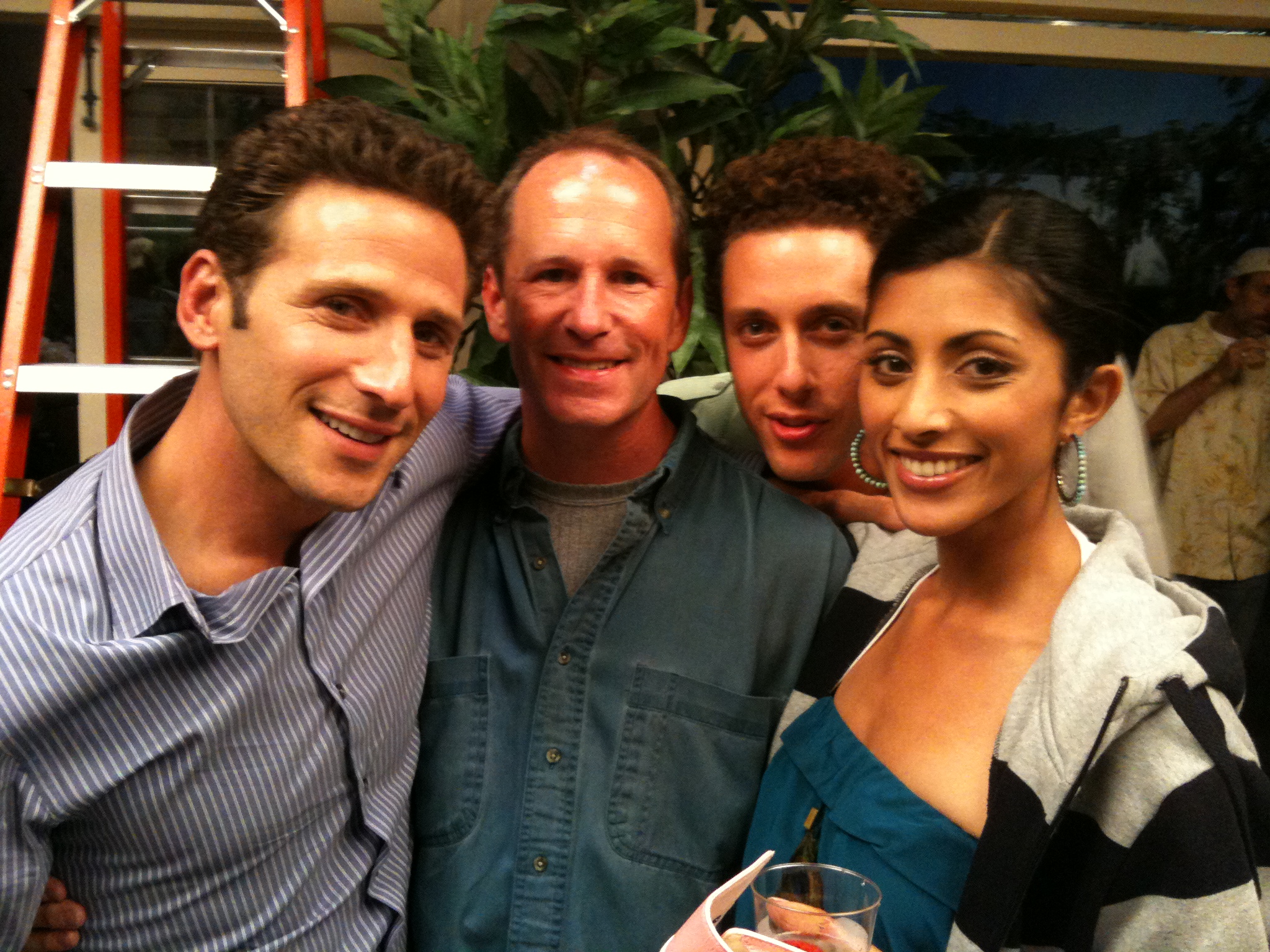 Mark Feuerstein, Alan Scott, Paulo Castanzo, and Reshma Shetty on the set of Royal Pains.