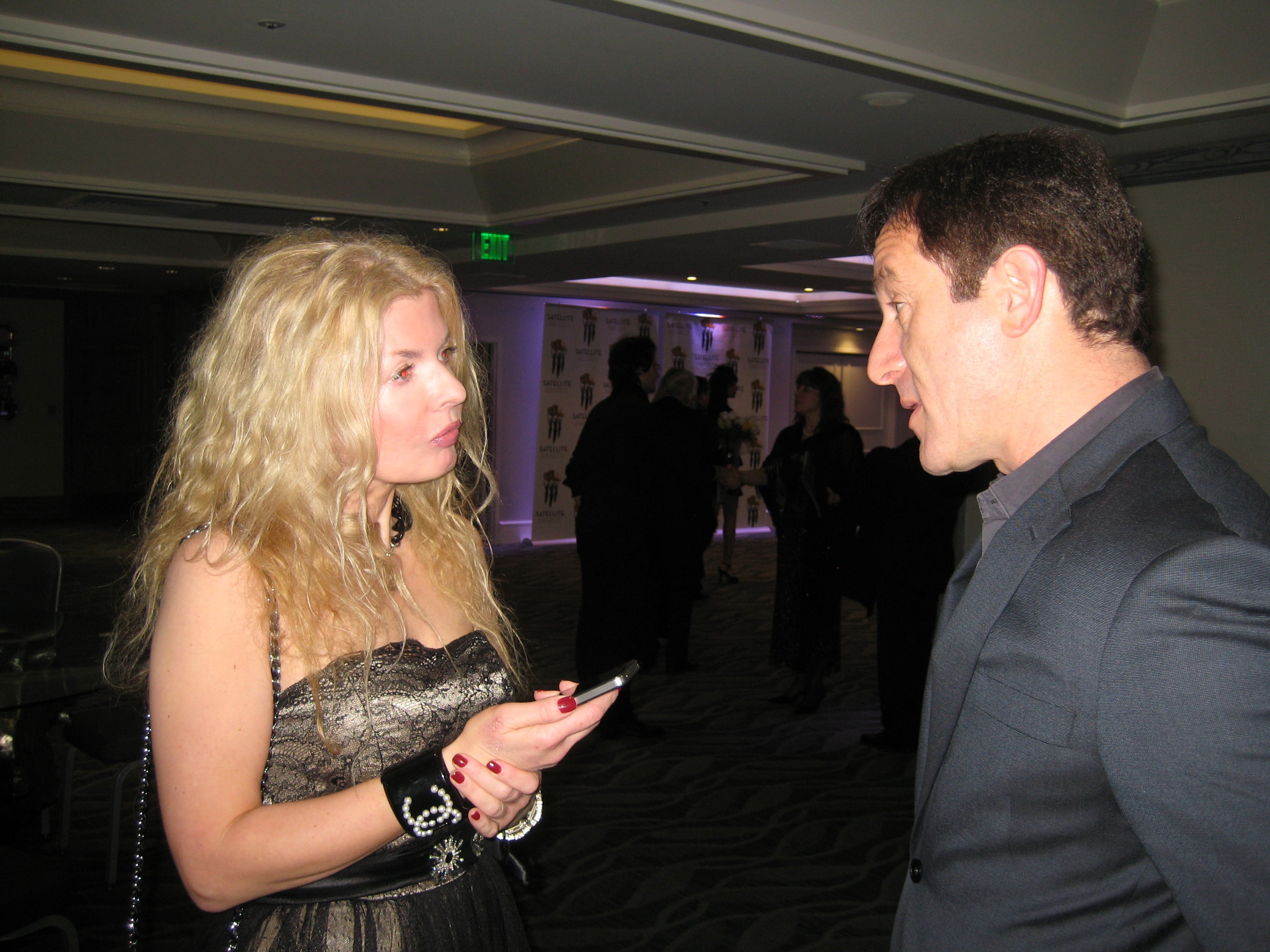 Adrienne Papp of Atlantic Publicity Interviewing Jason Isaacs at the 2012 International Press Academy Satellite Awards, December 2012, Los Angeles