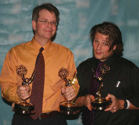 Writer/director Bruce Dellis (left) and actor/producer Max Bullis with the three Rocky Mountain Emmy® awards they won for 