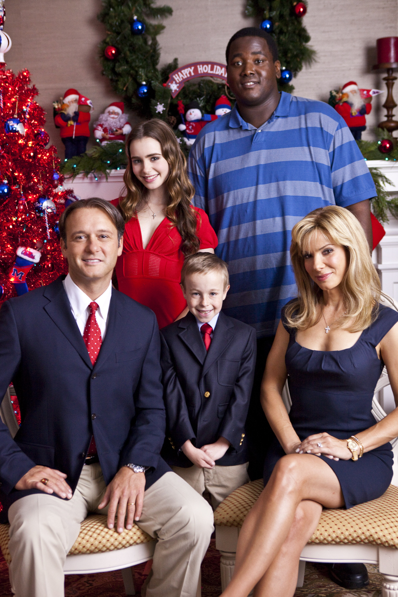 Still of Sandra Bullock, Tim McGraw, Jae Head, Quinton Aaron and Lily Collins in The Blind Side (2009)