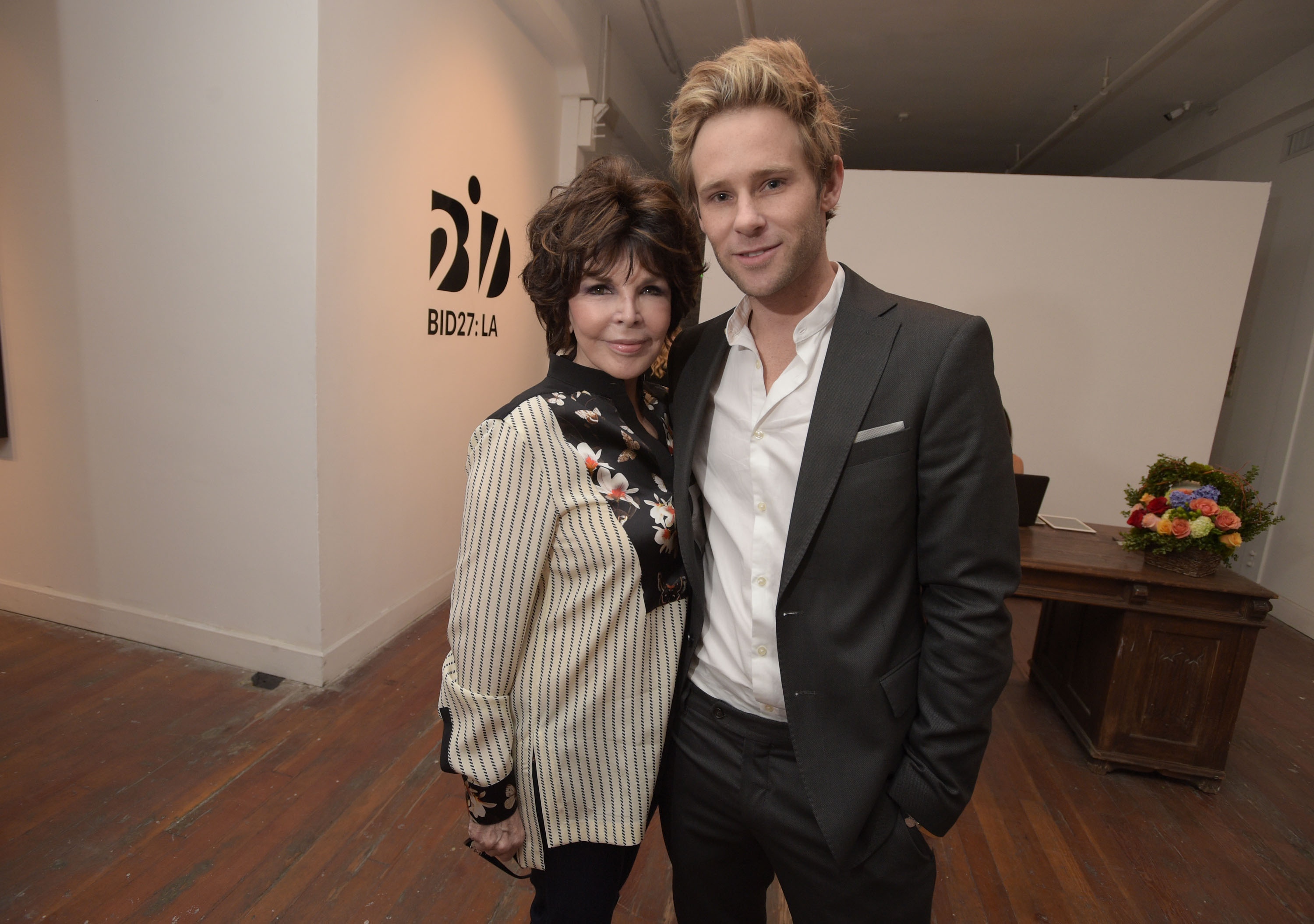 LOS ANGELES, CA - MAY 09: Singer Carole Bayer Sager (L) and artist Bryan Fox attend We. Alone. a photography exhibit by Bryan Fox at Think Tank Gallery on May 9, 2015 in Los Angeles, California.