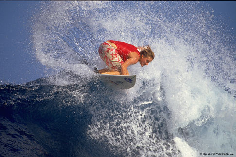 World class big-wave surfer Keala Kennelly off the lip in Tahiti.