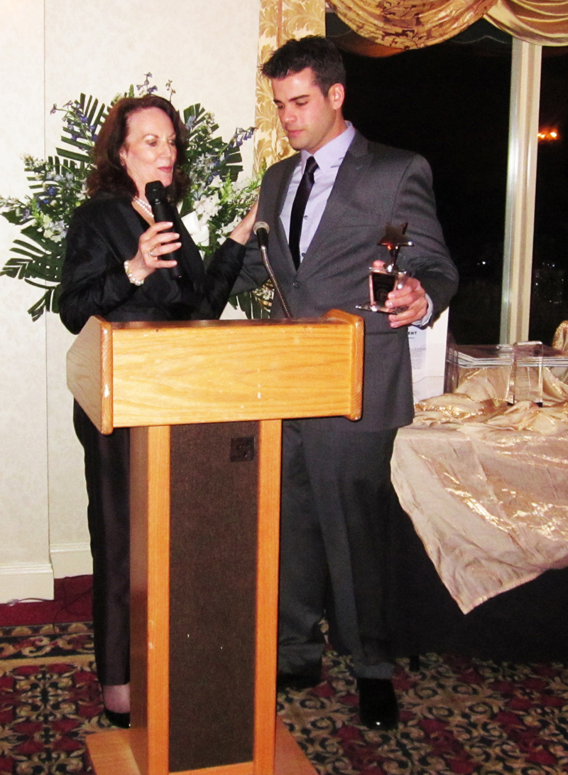 Joe Sernio Accepts The Robert Pastorelli Rising Star Award From The Sister of The Late Robert Pastorelli.