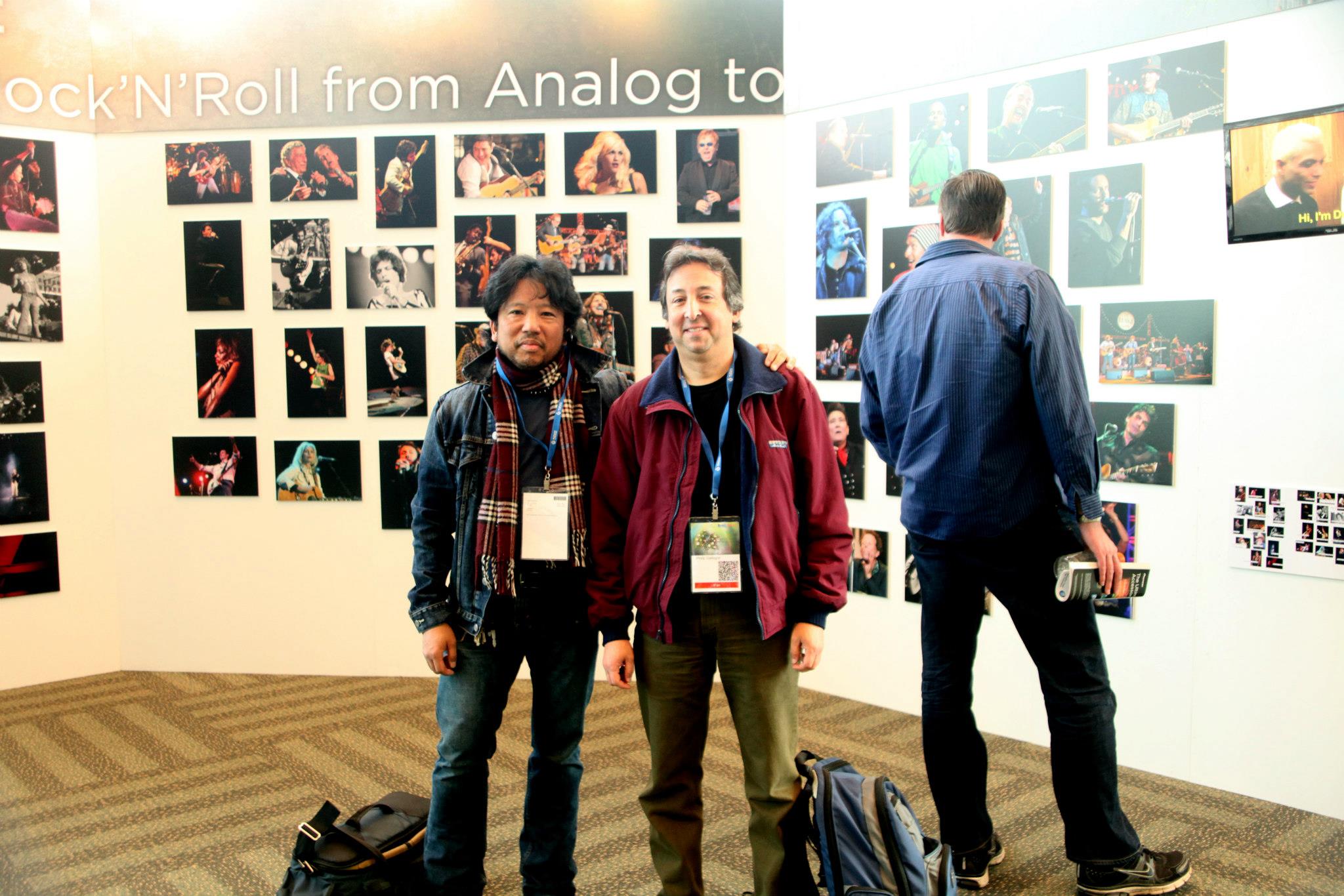 Craig Abaya and Philip J. Gallegos in front of Craig's film and photo exhibit (featured artist at MacWorld, San Francisco).