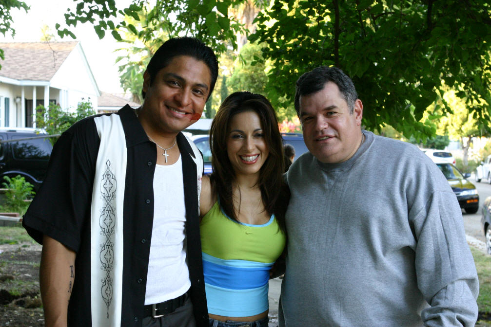 Omar Leyva with Delilah Cotto and Michael Badalucco on the set of 