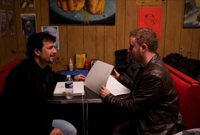 Still of John Romita Jr. and Mark Millar in Ateini cia arba gausi i duda! (2010)