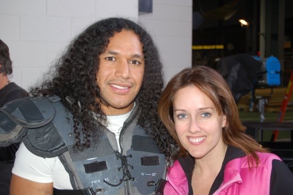 Heather with Troy Polamalu on the set of a Coke Zero commercial.