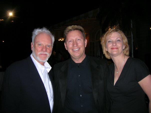 Dan with his wife Deb and Malcolm McDowell at Trumps in Palm Beach