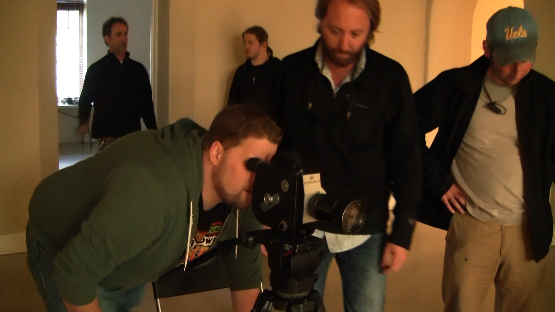 Matthew Bolton checking the shot on the set of, 