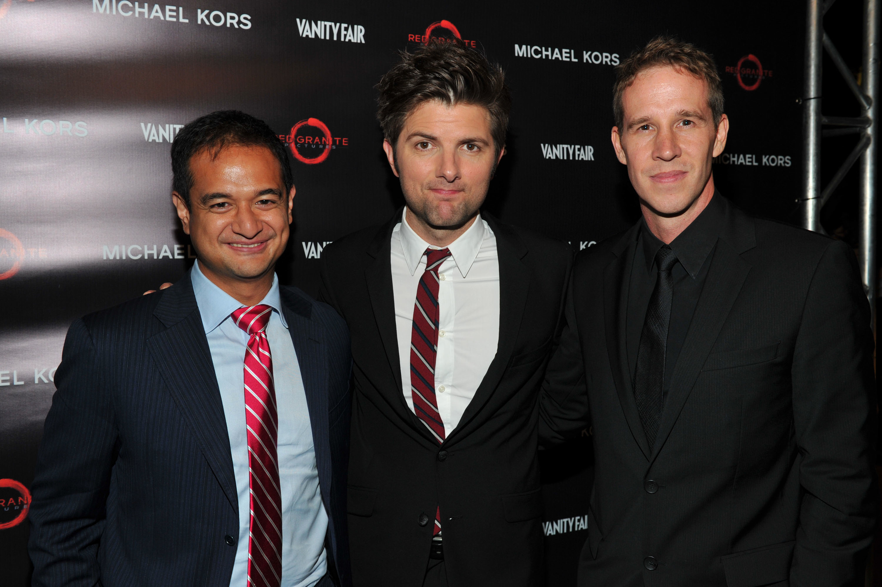 Producers Joey McFarland and Riza Aziz with Adam Scott at the 